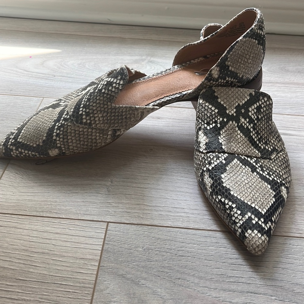 Worn once inside - excellent condition